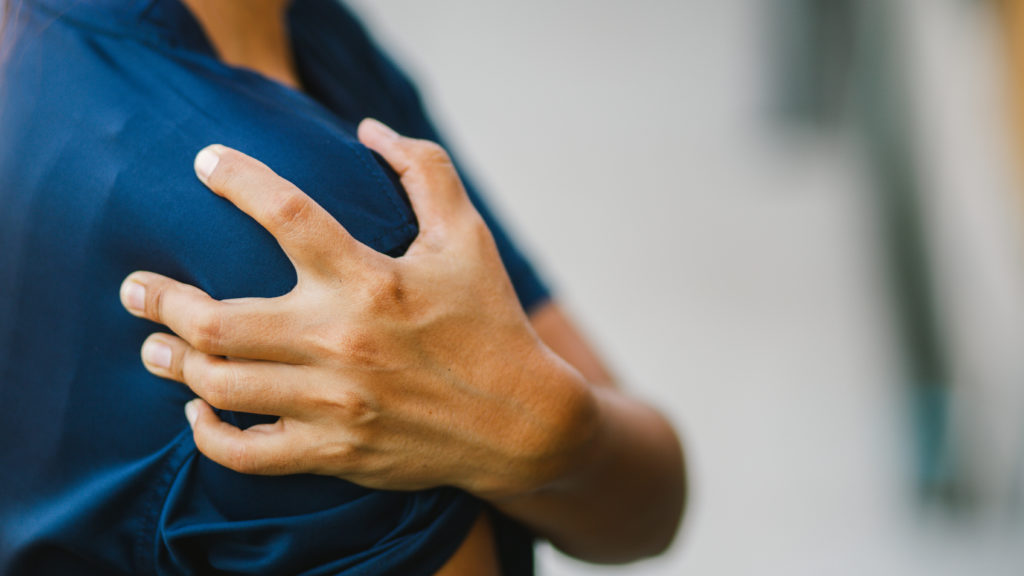 young woman with pain in shoulder, Ache in human body
